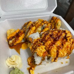 Tokyo Japanese Steakhouse - Big Mac Roll (front) and tsunami roll