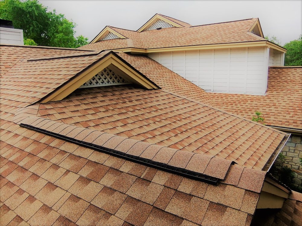 Slide of Tinsley Roofing