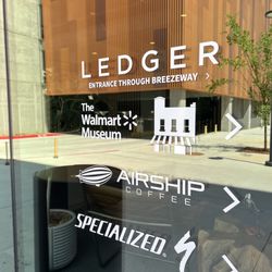 Airship Coffee - Temporary home of the Walmart Museum, bike shop, lobby coffee and membership workspaces.
