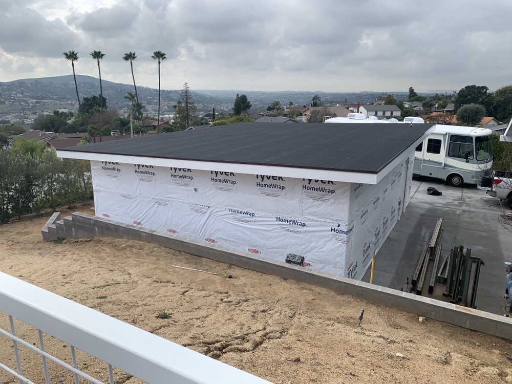 Slide of M G Roofing