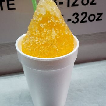 Brooke's Sno-World - Orange with vanilla ice cream inside - Ice Cream & Frozen Yogurt Near Me - Houma, Louisiana