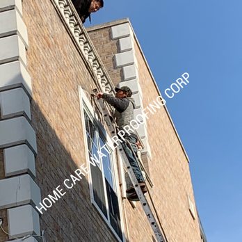 Home Care Waterproofing - Fixing up the cracks around the top window with waterproof cement - Waterproofing Near Me - Brooklyn, New York Home Care Waterproofing - Fixing up the cracks around the top window with waterproof cement - Waterproofing Near Me - Brooklyn, New York