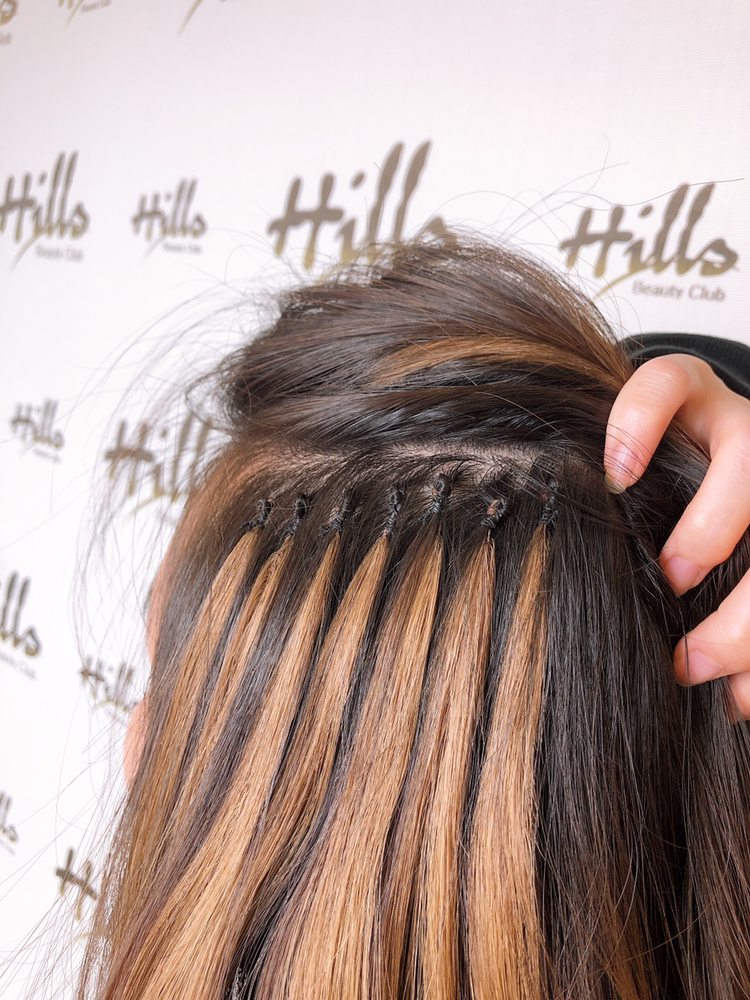 Woogie hair extensions Logo