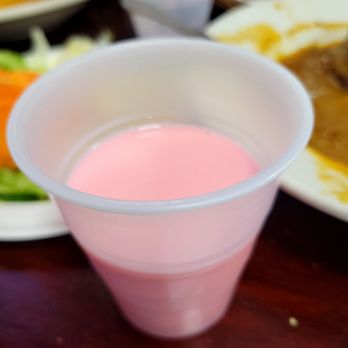 Dera Restaurant - Yummy pink drink is actually a mix of Rooh Afza juice concentrate and parmalat milk - Indian Near Me - Jackson Heights, New York Dera Restaurant - Yummy pink drink is actually a mix of Rooh Afza juice concentrate and parmalat milk - Indian Near Me - Jackson Heights, New York