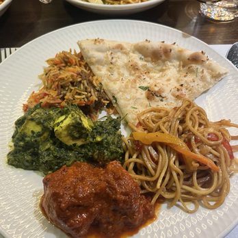 Spice Symphony - Lexington - Garlic Naan, saag paneer, chicken vindaloo, Indian Chinese Hakka Noodles - Indian Near Me - New York, New York Spice Symphony - Lexington - Garlic Naan, saag paneer, chicken vindaloo, Indian Chinese Hakka Noodles - Indian Near Me - New York, New York