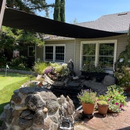 Shade sail over koi pond Shade sail over koi pond