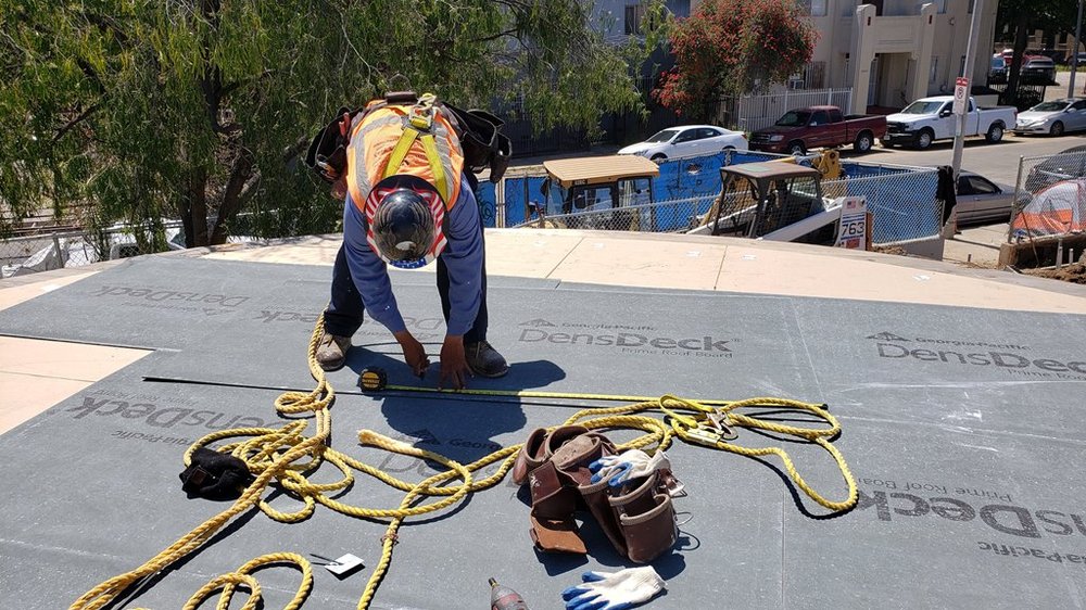 Slide of ADCO Roofing and Waterproofing