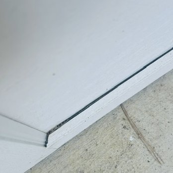 Thomas Garage Doors - Location 3- The overlay is separating and you can see the glue. - Garage Door Services Near Me - Mechanicsville, Maryland Thomas Garage Doors - Location 3- The overlay is separating and you can see the glue. - Garage Door Services Near Me - Mechanicsville, Maryland