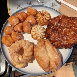 a plate of doughnuts and pastries a plate of doughnuts and pastries