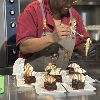Chef Amadeus - Chef plating our desserts with his fancy gold shavings. - Personal Chefs Near Me
