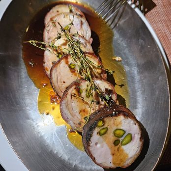 Craft - Bacon-wrapped rabbit...flavorful with a wonderful sauce but served colder than I would have liked. - New American Near Me - New York, New York