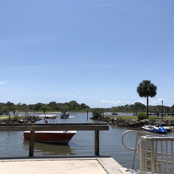Captains BBQ - a boat docked at a dock - Barbeque Near Me - Palm Coast, Florida