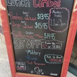 A menu is posted inside and a lunch menu board outside