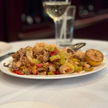 The Capital Grille - Pan-Fried Calamari with Hot Cherry Peppers - Steakhouses Near Me - Milwaukee, Wisconsin The Capital Grille - Pan-Fried Calamari with Hot Cherry Peppers - Steakhouses Near Me - Milwaukee, Wisconsin