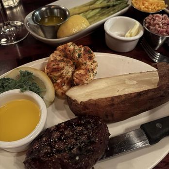 Captain Jack's - Filet and Lobster with 1/2 banked potato and side of asparagus - Seafood Near Me - Sunset Beach, California Captain Jack's - Filet and Lobster with 1/2 banked potato and side of asparagus - Seafood Near Me - Sunset Beach, California