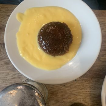 Goddards at Greenwich - Sticky toffee pudding with custard - British Near Me - London, XGL Goddards at Greenwich - Sticky toffee pudding with custard - British Near Me - London, XGL