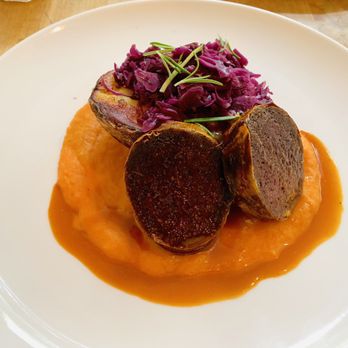 Veg Deli - Roasted not a duck breast served with a jacket potato, fried red cabbage, carrot puree with orange hint and ginger sauce - Vegan Near Me - Warsaw, MZ