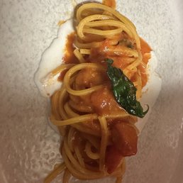 Spaghetti with tomato and burrata cream