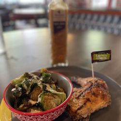 Nando's Peri-Peri - Lemon herb chicken with a side of fried Brussels sprouts