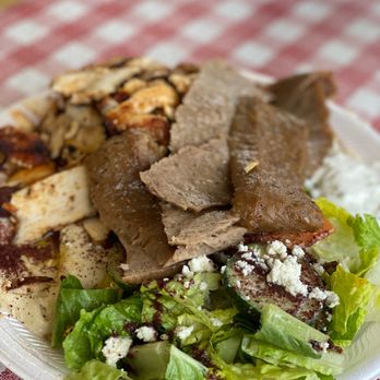 Byblos - a plate of food on a table - Mediterranean Near Me - Metairie, Louisiana Byblos - a plate of food on a table - Mediterranean Near Me - Metairie, Louisiana