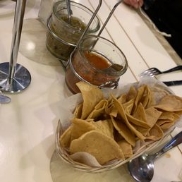 The amazing nachos with the two salsa options.