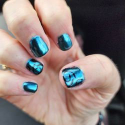 Solar Nails & Spa - This is what I got. Design is cute, and what I wanted. Color is Def not.