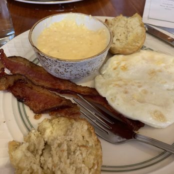 Big Jones - Simple southern breakfast with two eggs, a biscuit, bacon, and cheesy grits - Southern Near Me - Chicago, Illinois