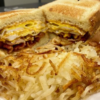 Jet-A-Way Cafe - ows a breakfast sandwich and hash browns - Breakfast & Brunch Near Me - Sanford, Florida Jet-A-Way Cafe - ows a breakfast sandwich and hash browns - Breakfast & Brunch Near Me - Sanford, Florida
