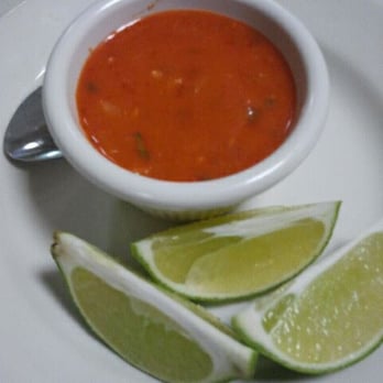 El Idolo - a bowl of soup and lime slices - Latin American Near Me - Norwalk, Connecticut El Idolo - a bowl of soup and lime slices - Latin American Near Me - Norwalk, Connecticut