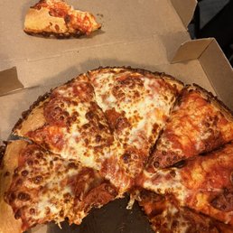Pizza with only half of it with toppings