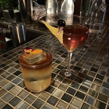The Baldwin Bar - Black Bay pain killer (left) and Specialty drink (right) - Cocktail Bars Near Me - Woburn, Massachusetts The Baldwin Bar - Black Bay pain killer (left) and Specialty drink (right) - Cocktail Bars Near Me - Woburn, Massachusetts