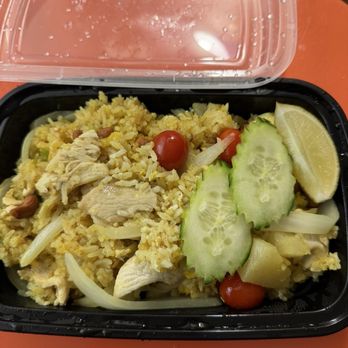 Klom Klom Thai - Pineapple Fried Rice with chicken. - Thai Near Me - Savannah, Georgia Klom Klom Thai - Pineapple Fried Rice with chicken. - Thai Near Me - Savannah, Georgia