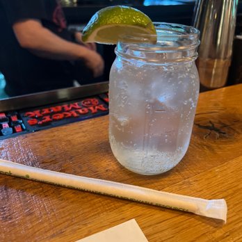 Harvest Pizzeria - Dublin - a drink in a mason jar with a lime wedge - Pizza Near Me - Dublin, Ohio Harvest Pizzeria - Dublin - a drink in a mason jar with a lime wedge - Pizza Near Me - Dublin, Ohio