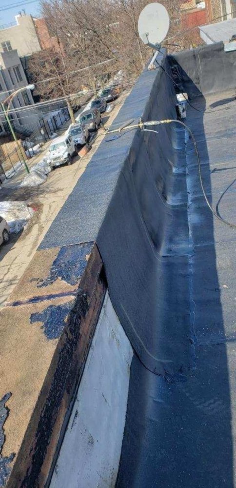 Slide of AAM Roofing & Masonry