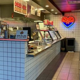 Order here and have a seat.  Your food will be delivered to your table.