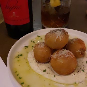 OLIVIA - Arancini and delicious Sangiovese wine and o fashioned cocktail - Italian Near Me - Tampa, Florida OLIVIA - Arancini and delicious Sangiovese wine and o fashioned cocktail - Italian Near Me - Tampa, Florida