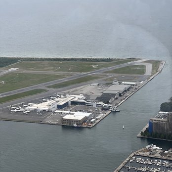 CN Tower - View of YTZ Billy Bishop airport + ferry - Landmarks & Historical Buildings Near Me - Toronto, Ontario