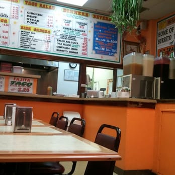 Buenos Dias Burritos - a table and chairs in a restaurant - Mexican Near Me - Itasca, Illinois