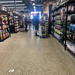 Employee meeting blocking entire main isle; while you're looking for an item and not one person asking if you need help. GFYS