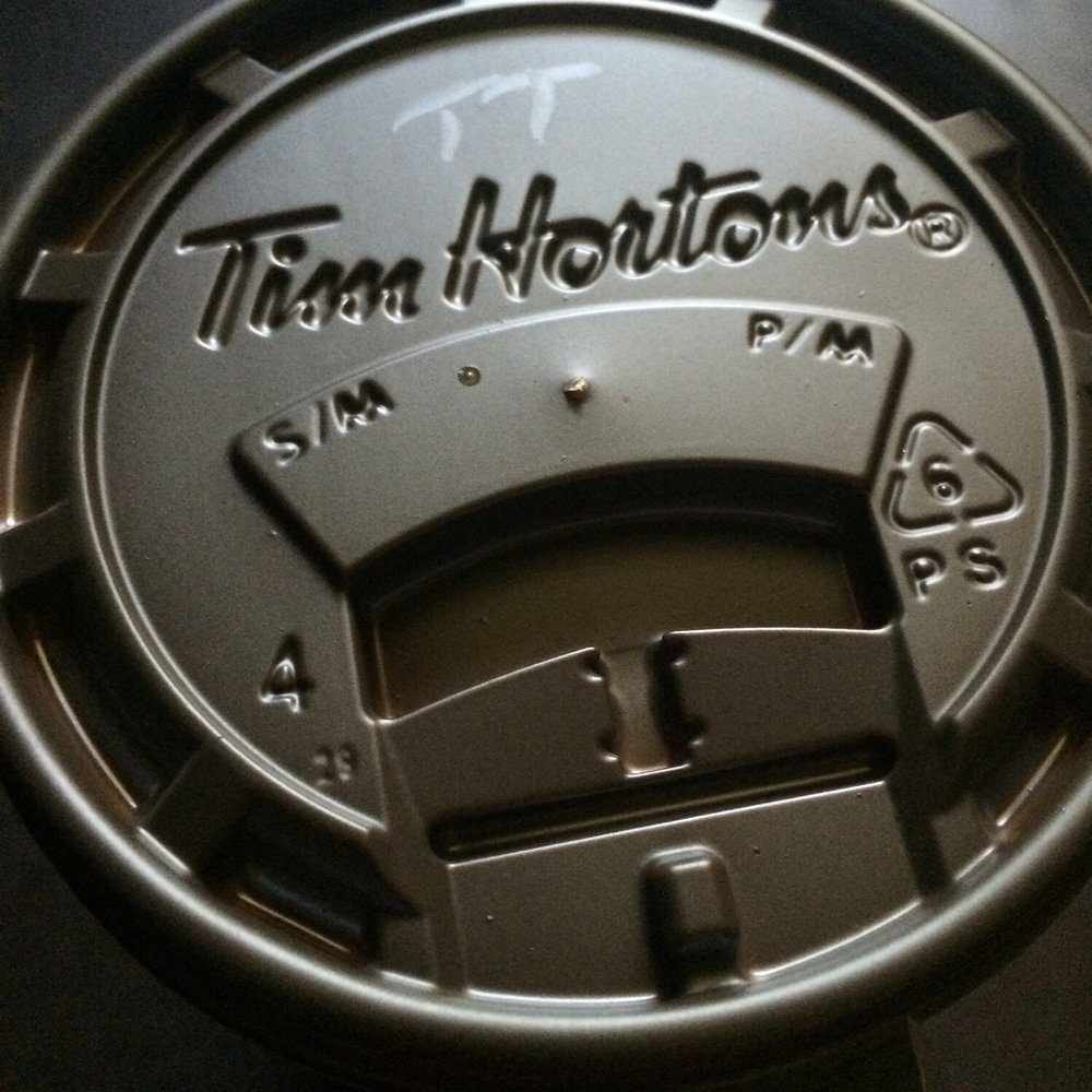 The "TT" on the cup stands for "triple, triple" which means "three creams, three sugars" in Tim Horton speak! The "TT" on the cup stands for "triple, triple" which means "three creams, three sugars" in Tim Horton speak!