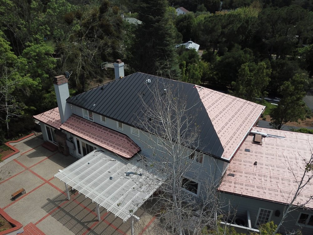 Slide of J Saenz Roofing