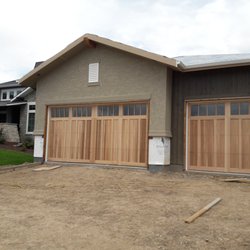 Milestone Garage Door and Service - Cedar overlay carriage house doors