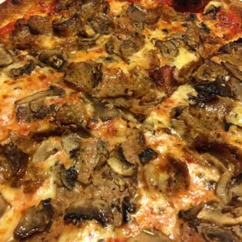 Elio Pizza On Fire - Sausage and mushroom pizza - Pizza Near Me - Addison, Illinois