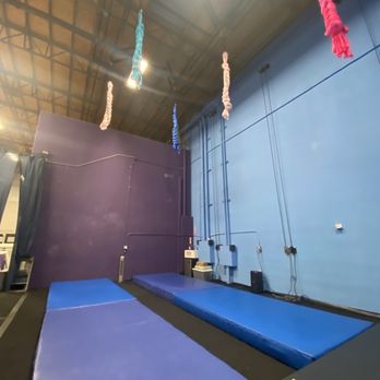 Skybound Aerial Arts Collective - When you walk in- the 4 points plus the instructors point- they haven't been let down yet. Thick crash mats for safety. - Aerial Fitness Near Me - Vista, California Skybound Aerial Arts Collective - When you walk in- the 4 points plus the instructors point- they haven't been let down yet. Thick crash mats for safety. - Aerial Fitness Near Me - Vista, California