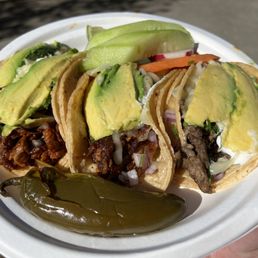 Al pastor, carnitas, y asada deluxe tacos Al pastor, carnitas, y asada deluxe tacos
