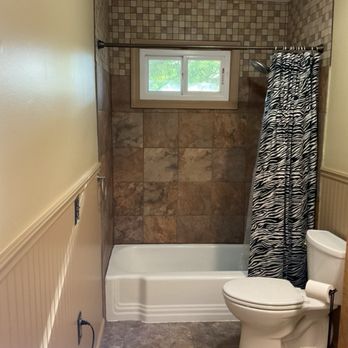 Venpro Construction - Bathroom painted, and the tiling done above original tiles (small tiles) - Painters Near Me Venpro Construction - Bathroom painted, and the tiling done above original tiles (small tiles) - Painters Near Me