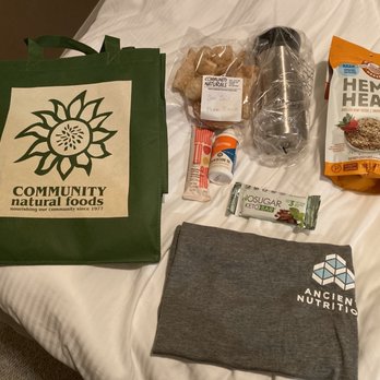 Community Natural Foods - items laid out on a bed - Health Markets Near Me - Calgary, Alberta Community Natural Foods - items laid out on a bed - Health Markets Near Me - Calgary, Alberta