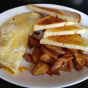 The Tipper Restaurant - Mushroom cheddar omelette with sourdough toast - Burgers Near Me - Vancouver, British Columbia The Tipper Restaurant - Mushroom cheddar omelette with sourdough toast - Burgers Near Me - Vancouver, British Columbia