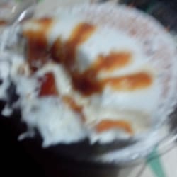 Frostings - Leche Flan cupcake post transport. It didn't survive. Best to put it out of its misery.