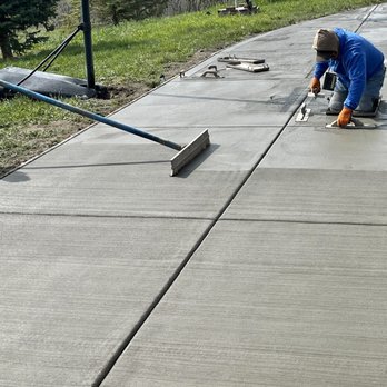 Diehl Concrete - Ryan applying a brush finish. - Masonry/Concrete Near Me - Sedalia, Colorado Diehl Concrete - Ryan applying a brush finish. - Masonry/Concrete Near Me - Sedalia, Colorado